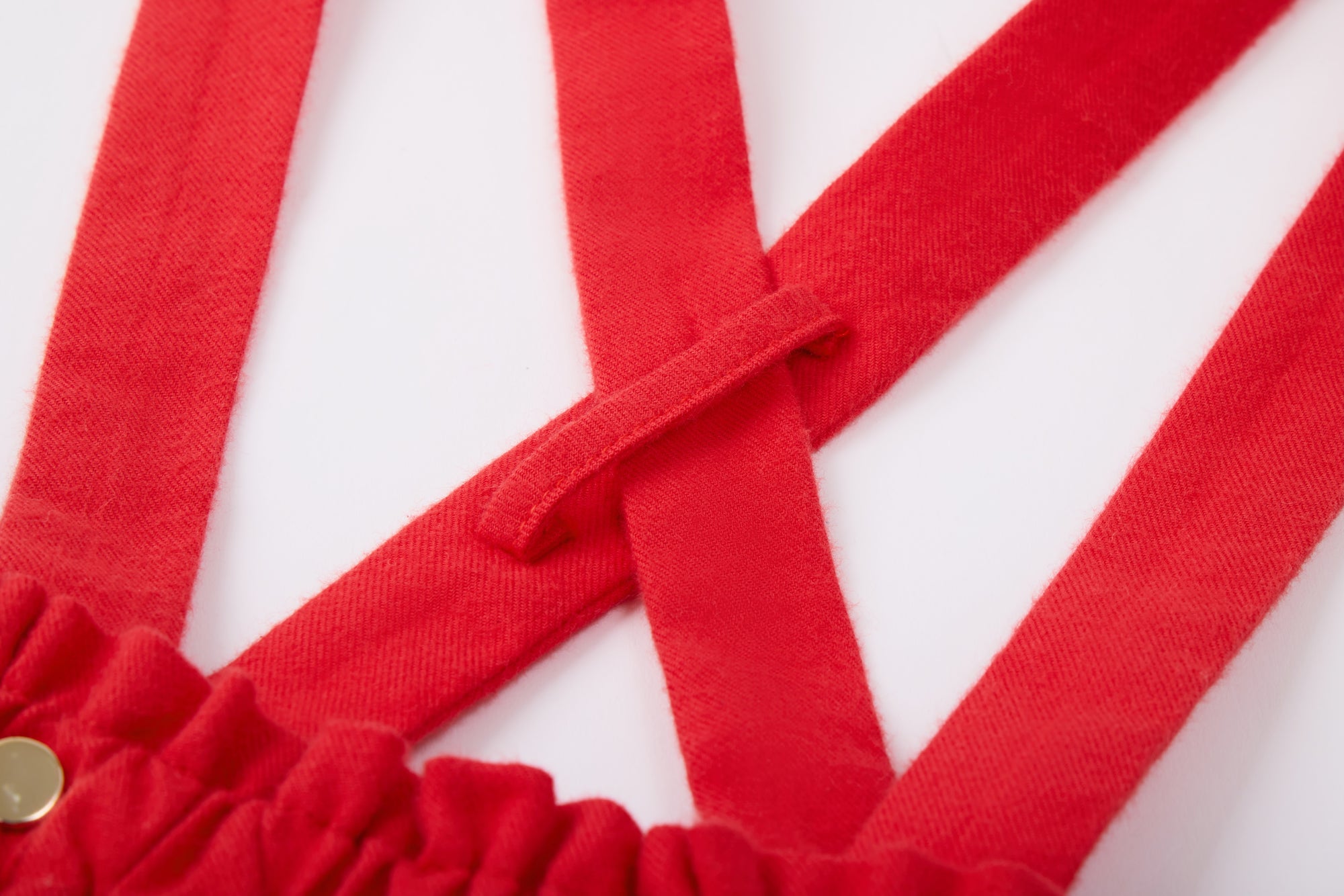 Red skirt with suspenders from MIBONBON