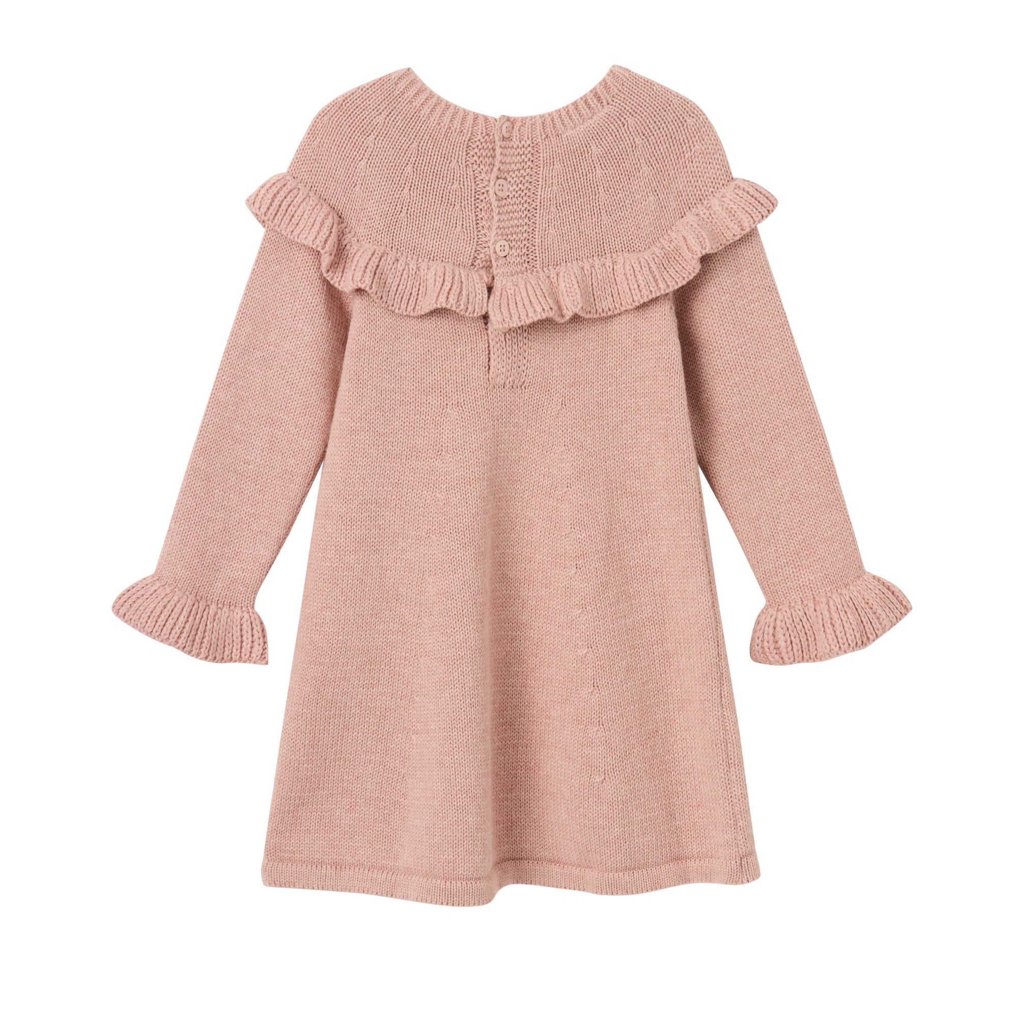 Pink knitted dress with a fluffy pink pom-pom.