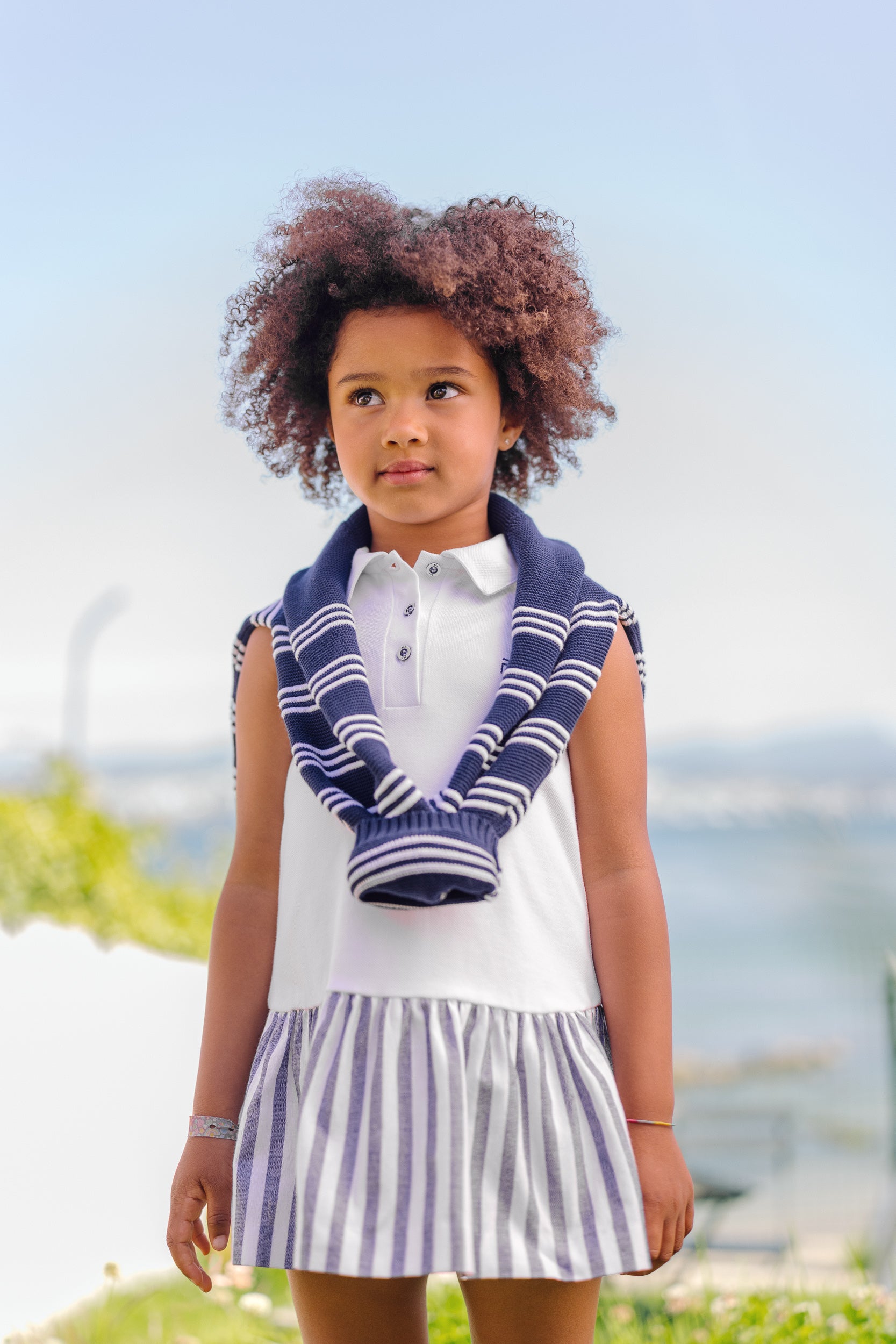 Dress for girl with polo-style knit top and striped fabric skirt
