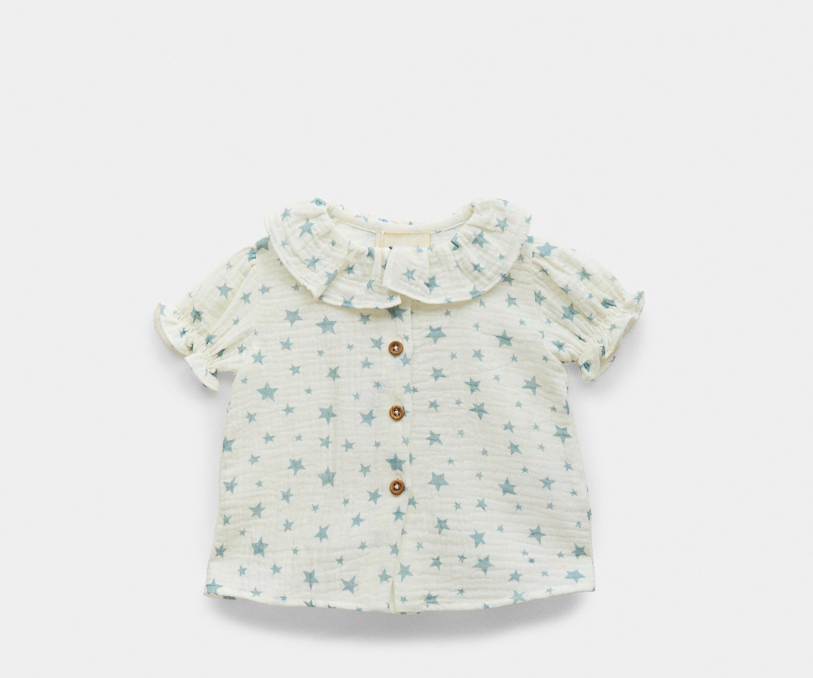 Baby girl blouse with green stars