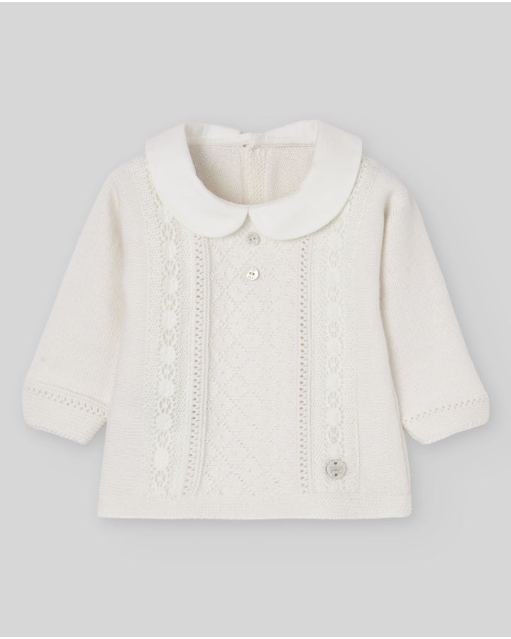 Knitted sweater with round neckline