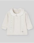Knitted sweater with round neckline