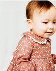 Garnet flannel dress with exclusive floral print.
