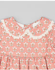 Garnet flannel dress with exclusive floral print.