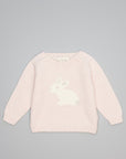 A light pink knit sweater for toddlers, featuring a white rabbit motif on the chest, displayed flat against a neutral gray background.