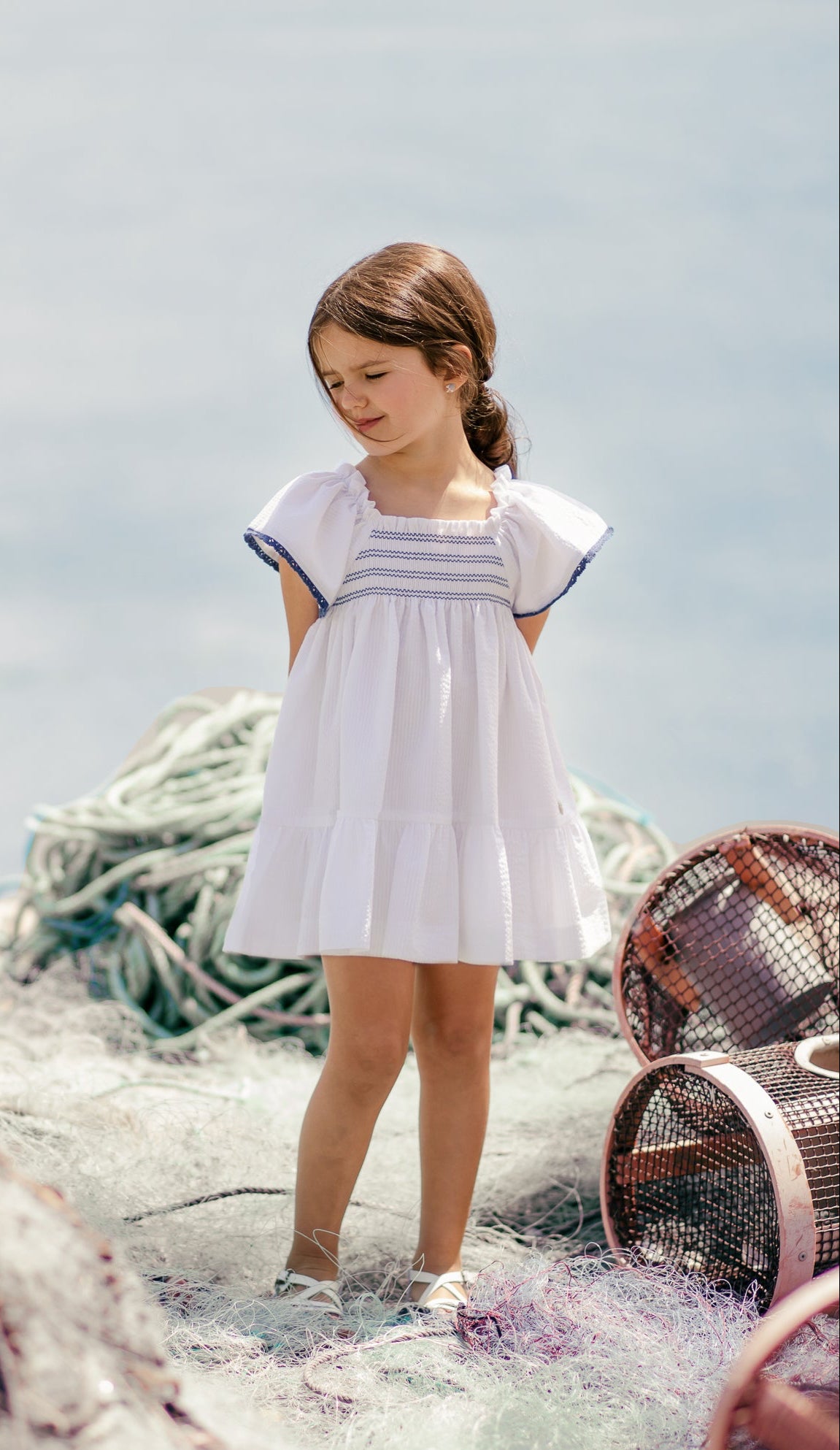 Girls&#39; dress with ruffled details