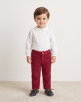 Corduroy pants in a deep burgundy red