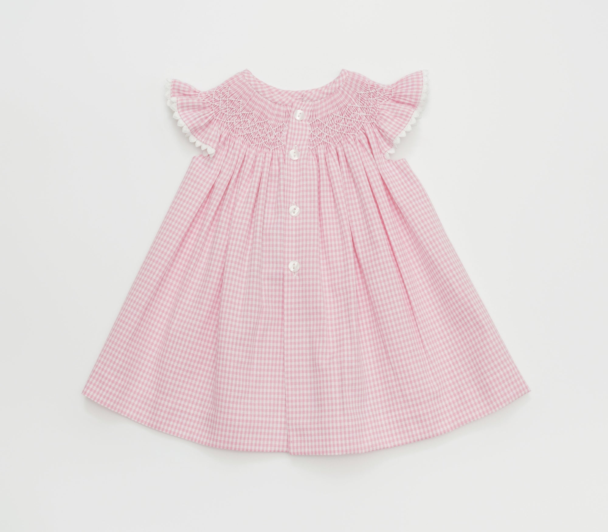 Light pink artisan dress for babies