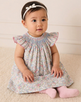 Smocked floral dress with Flutter sleeves