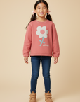 Red sweatshirt with a white flower from MIBONBON