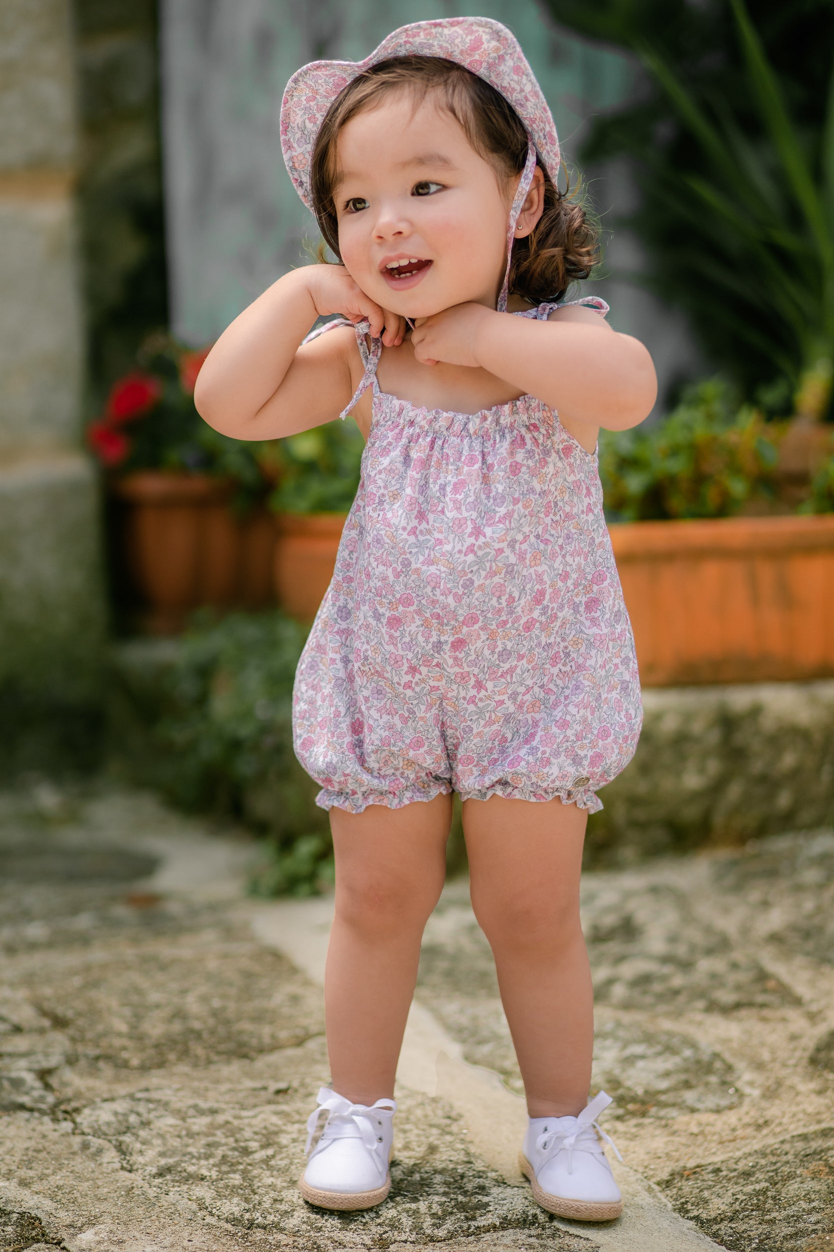 Short romper for baby girls in pink