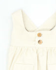 CREAM DUNGAREES WITH ELASTIC BANDS AND CORDUROY BUTTONS