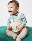 CREAM DUNGAREES WITH ELASTIC BANDS AND CORDUROY BUTTONS