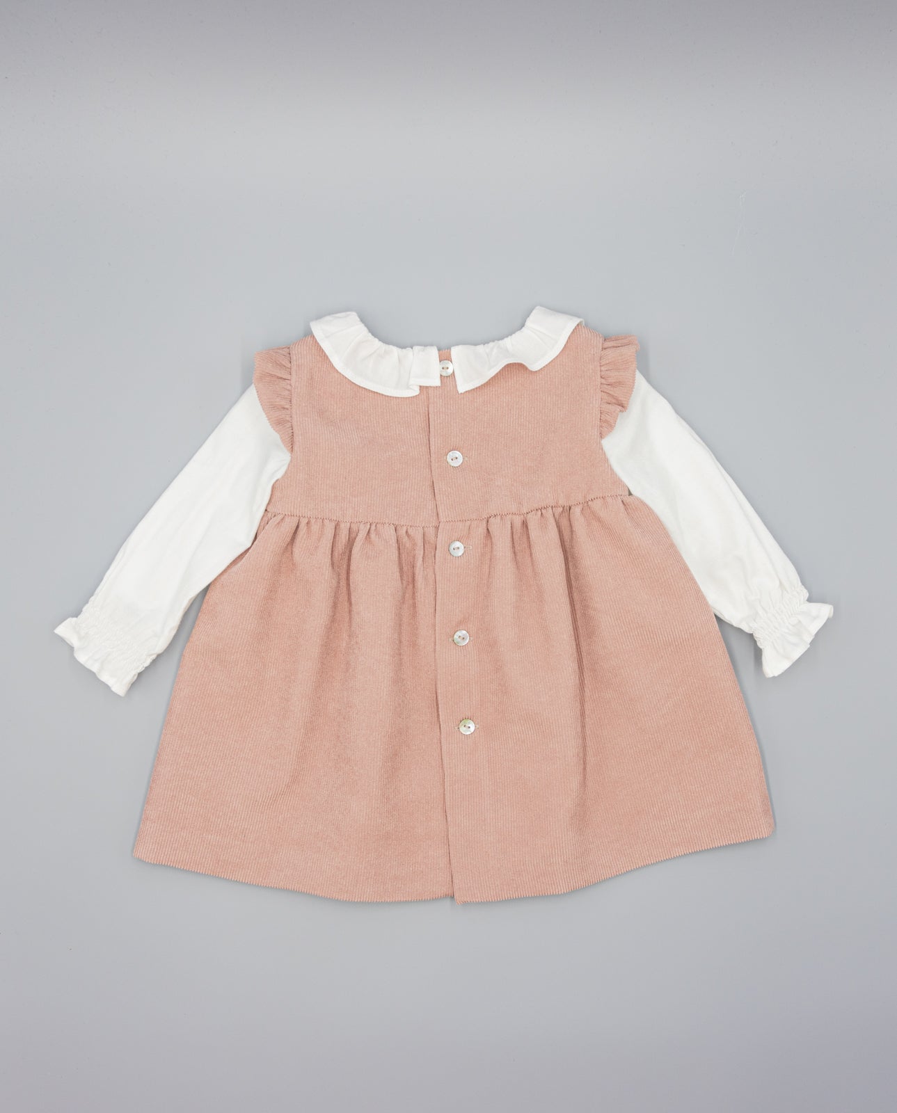 PINK CORDUROY PINAFORE WITH WHITE VIELLA