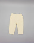 BEIGE TEXTURED TROUSERS WITH RUFFLES