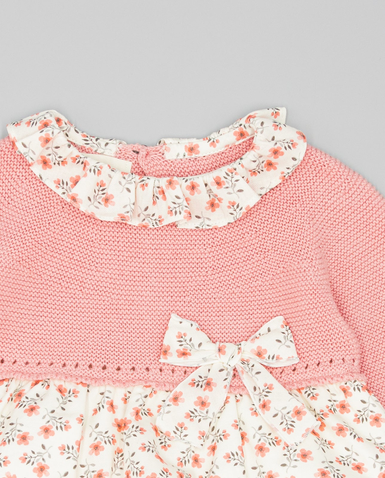 PINK KNIT ROMPER WITH FLORAL PRINTED FABRIC