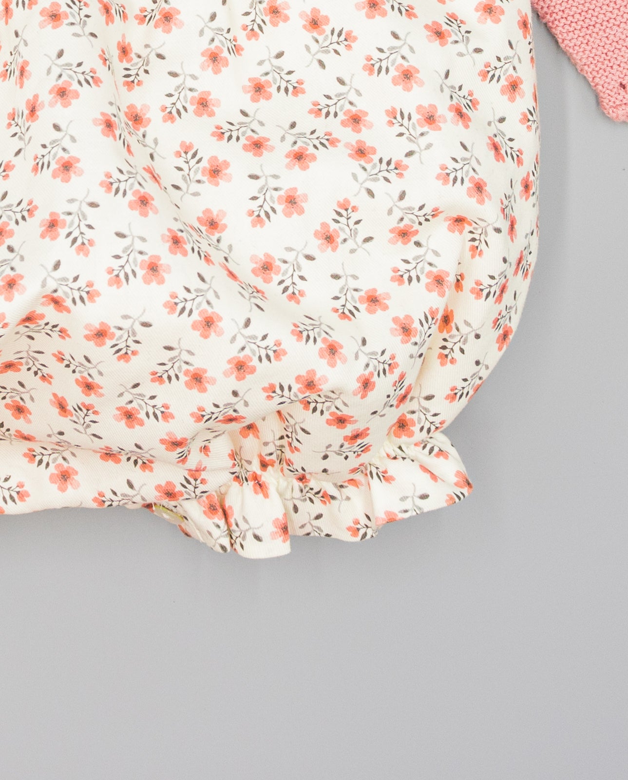 PINK KNIT ROMPER WITH FLORAL PRINTED FABRIC