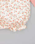PINK KNIT ROMPER WITH FLORAL PRINTED FABRIC