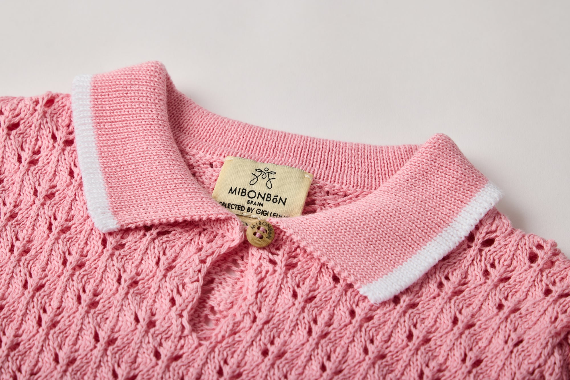 Pink knit polo sweater for girls