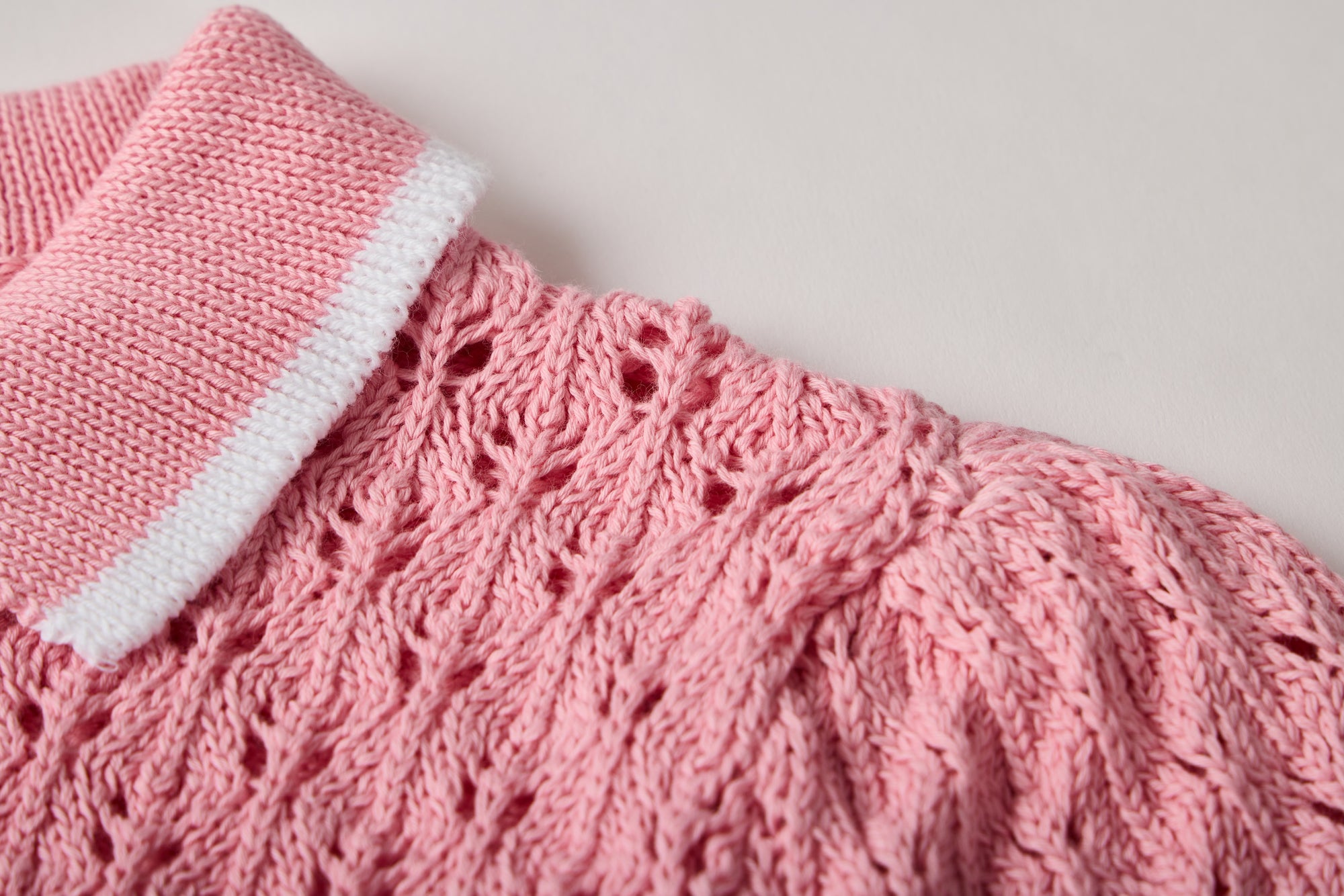 Pink knit polo sweater for girls