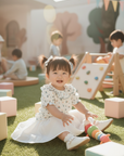 Asian baby girl in floral blouse outdoor