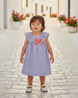 Asian Girl in Striped Dress on Spanish Village Street