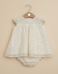 Ivory Embroidered Baby Dress - Beige Background