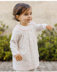 Long-sleeved dress for baby girl with a charming penguin print