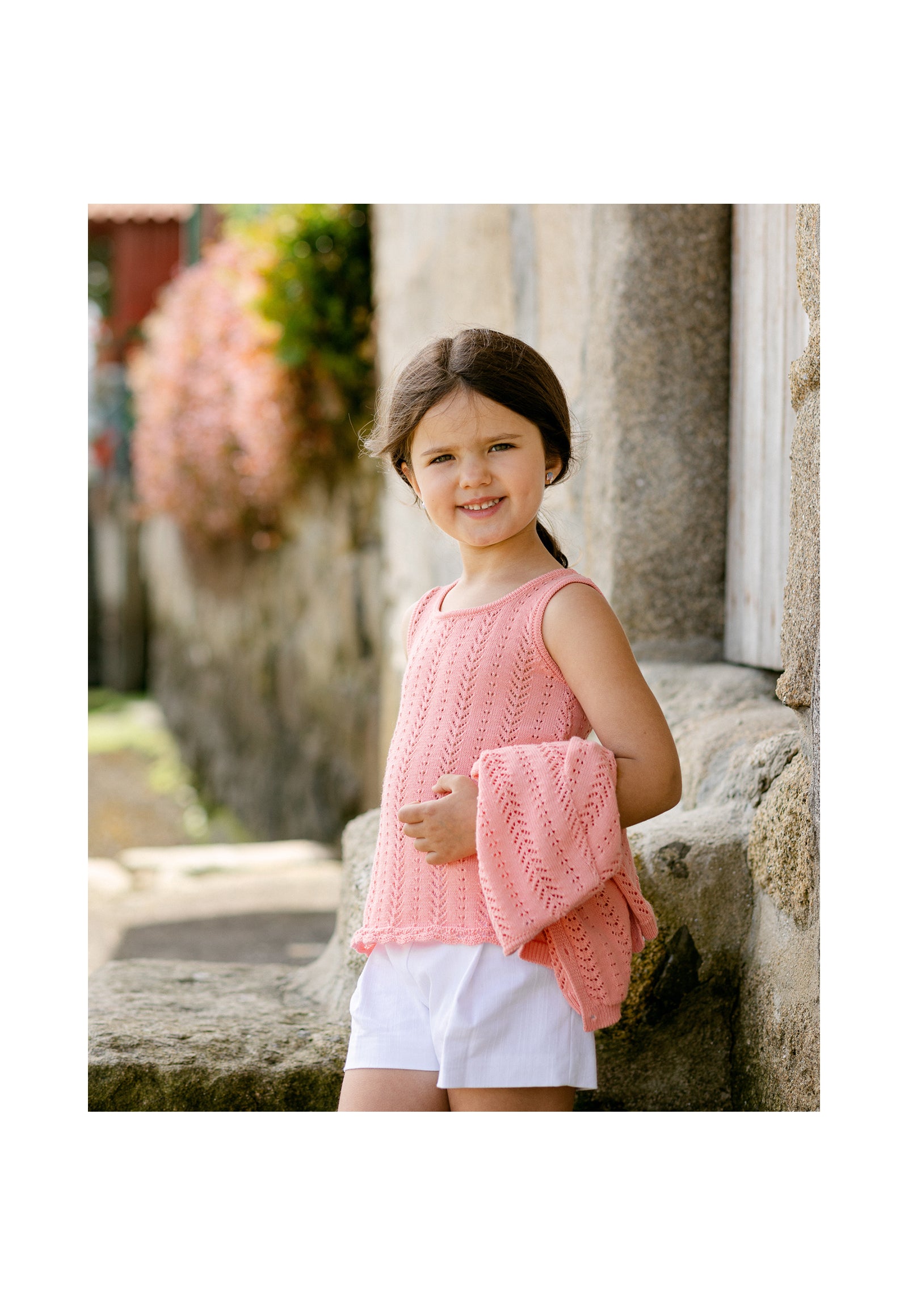 Knit top for girls in salmon colour