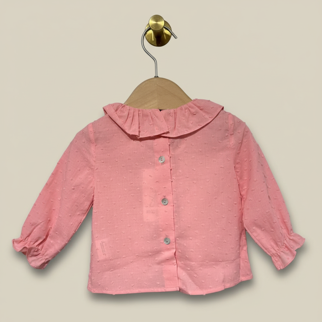 Pink Ruffle Blouse Back View on Beige Background