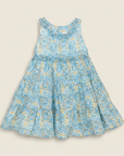 Product photo of blue floral dress on beige background