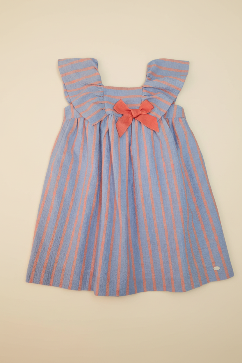 Striped Girls' Dress Flat Lay on Beige Background